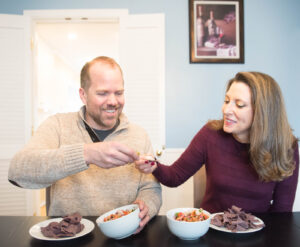 couple food toasting